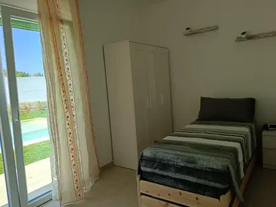 Letto o letti in una camera di CoMFORT HOME