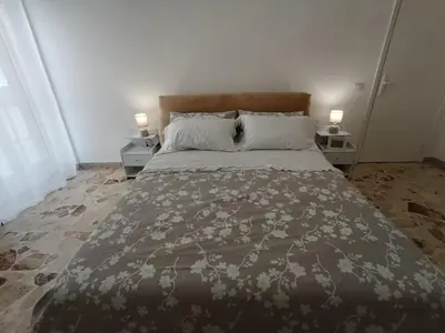 Letto o letti in una camera di Marinella House