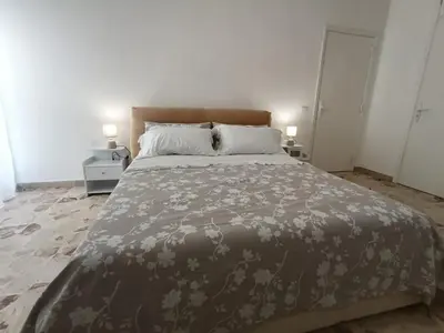 Letto o letti in una camera di Marinella House