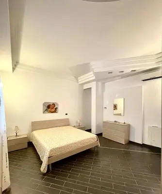 Letto o letti in una camera di Mennula Duci