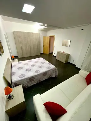 Letto o letti in una camera di Mennula Duci