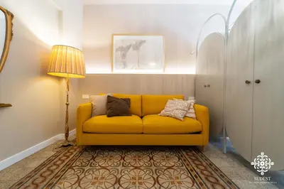 Area soggiorno di Gli Archi di Aretusa - Design Apartment in the heart of Ortigia