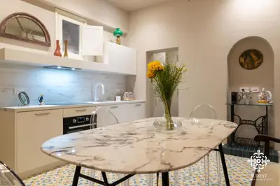 Cucina o angolo cottura di Gli Archi di Aretusa - Design Apartment in the heart of Ortigia