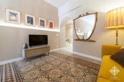 TV o dispositivi per l'intrattenimento presso Gli Archi di Aretusa - Design Apartment in the heart of Ortigia