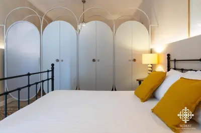 Letto o letti in una camera di Gli Archi di Aretusa - Design Apartment in the heart of Ortigia