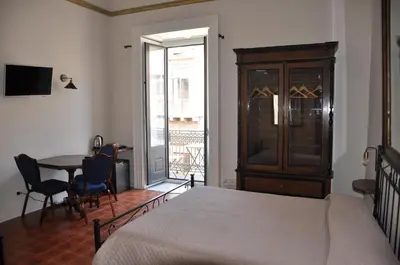 Letto o letti in una camera di Asmundo Palace Suites & Spa
