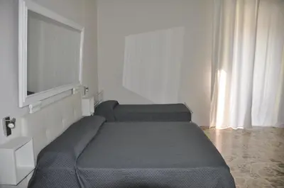 Letto o letti in una camera di Asmundo Palace Suites & Spa
