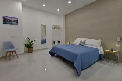 Letto o letti in una camera di Appartamento Ortigia Vicolo Lettighieri 24