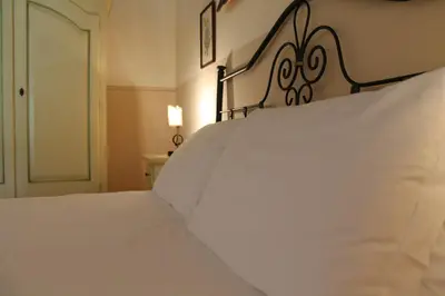 Letto o letti in una camera di Villa Teresa