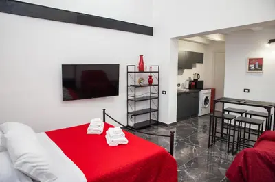 Letto o letti in una camera di 3 Rooms Catania - Vulcano bright independent studio apartment