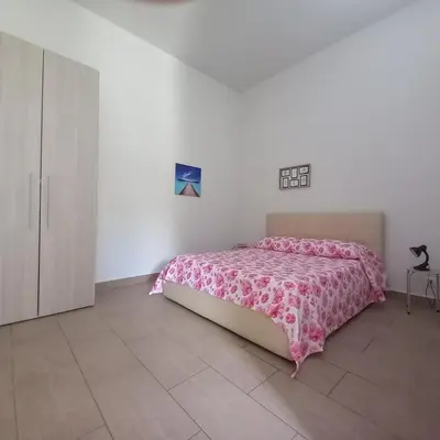 Letto o letti in una camera di Dimore del Carrubo Villa Ovest