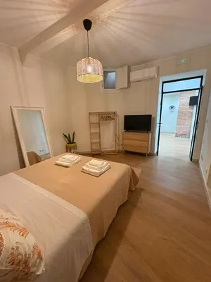 Letto o letti in una camera di La Teresina