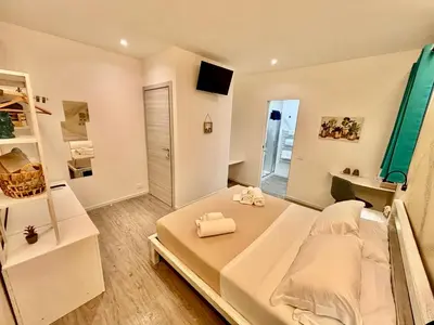 Letto o letti in una camera di Da Zia Manny
