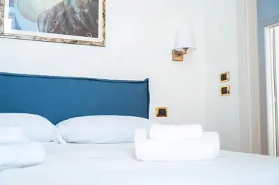 Letto o letti in una camera di Deco' Home - Ortigia al Duomo whit Terrace