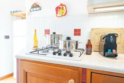 Cucina o angolo cottura di Deco' Home - Ortigia al Duomo whit Terrace