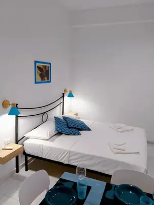 Letto o letti in una camera di Casa MALFITANO Siria