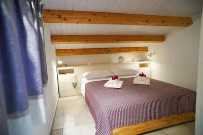 Letto o letti in una camera di Talia chi Meravigghia