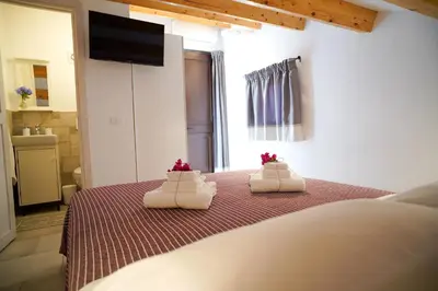 Letto o letti in una camera di Talia chi Meravigghia