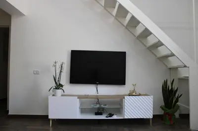 TV o dispositivi per l'intrattenimento presso Eterea Apartment