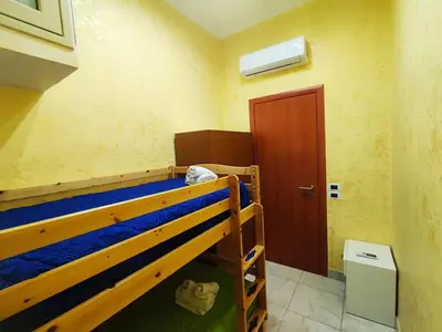 Letto o letti in una camera di Appartamento Sebastiano