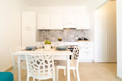 Cucina o angolo cottura di GuestHost - Borgo 84 Marzamemi - Brezza Marina