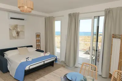 Letto o letti in una camera di Marzamemi casa di charme con vista mare e piscina