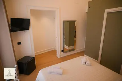 TV o dispositivi per l'intrattenimento presso Amenano Relais Rooms