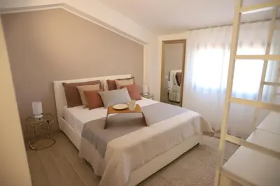 Letto o letti in una camera di Sweet Orange