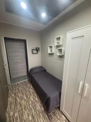 Letto o letti in una camera di Sciuto house