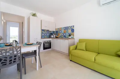 Cucina o angolo cottura di GuestHost - Borgo 84 Marzamemi - Interno 23