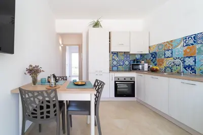 Cucina o angolo cottura di GuestHost - Borgo 84 Marzamemi - Interno 23