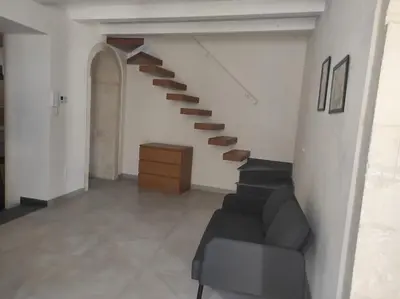 Area soggiorno di Casa Rizzo, 2