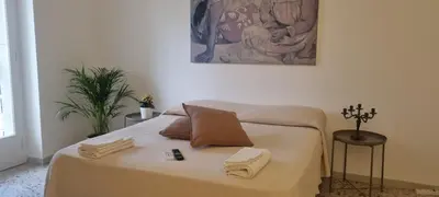Letto o letti in una camera di Beautiful Apartment near Ortigia & Central Stations