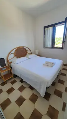 Letto o letti in una camera di La casa di Federica