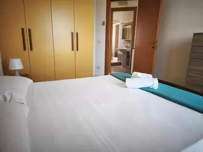 Letto o letti in una camera di VILLA SERENA HOLIDAYS Marzamemi San Lorenzo