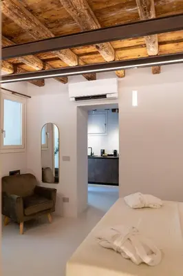 Letto o letti in una camera di Re Carlo - Ortigia Luxury Suite