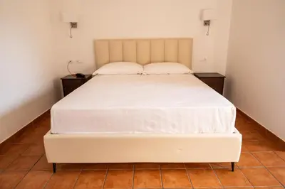 Letto o letti in una camera di Tenuta Madre Vita