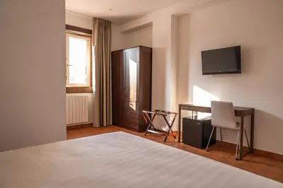 Letto o letti in una camera di Tenuta Madre Vita