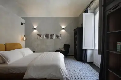 Letto o letti in una camera di Napoleone Suite