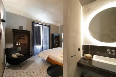 Letto o letti in una camera di Napoleone Suite
