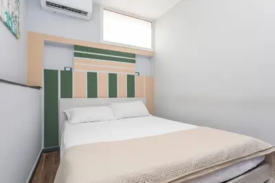 Letto o letti in una camera di Garibaldi Rooms