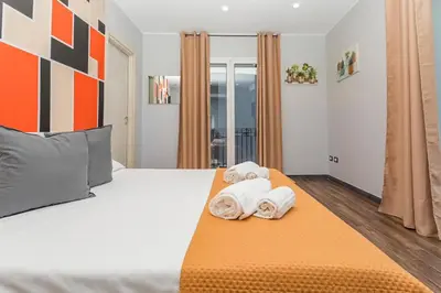 Letto o letti in una camera di Garibaldi Rooms