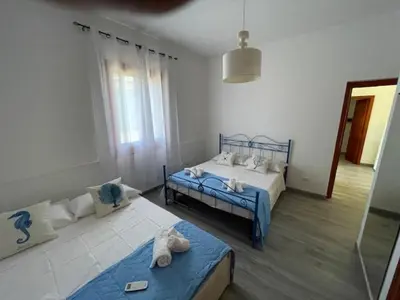 Letto o letti in una camera di Villa Marzamemi 200 m dal mare