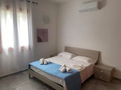 Letto o letti in una camera di Villa Marzamemi 200 m dal mare