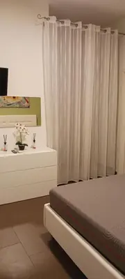 Letto o letti in una camera di Casa Camillo via Camillo Benso di Cavour n 63bis