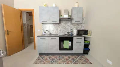 Cucina o angolo cottura di A Casa re Niputi