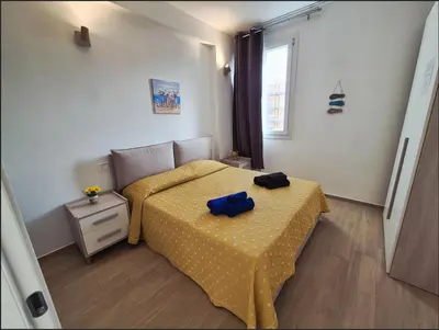 Letto o letti in una camera di The Sun 365 - Sea View Apartment