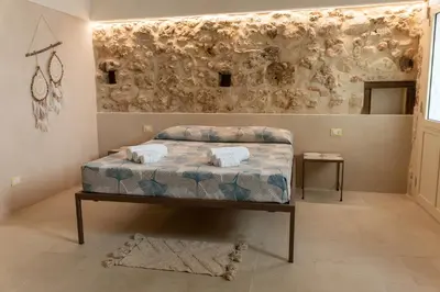 Letto o letti in una camera di Dimora delle Volte 2 bagni,centro storico Noto