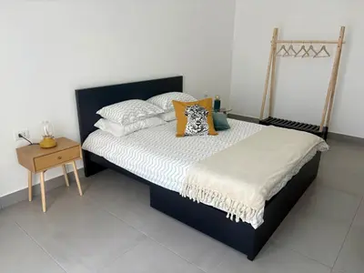 Letto o letti in una camera di Casa IRIS