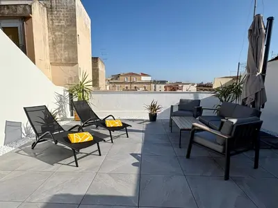 Area soggiorno di Casa IRIS